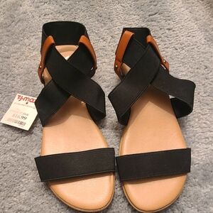 XOXO black and tan sandals. New with tags